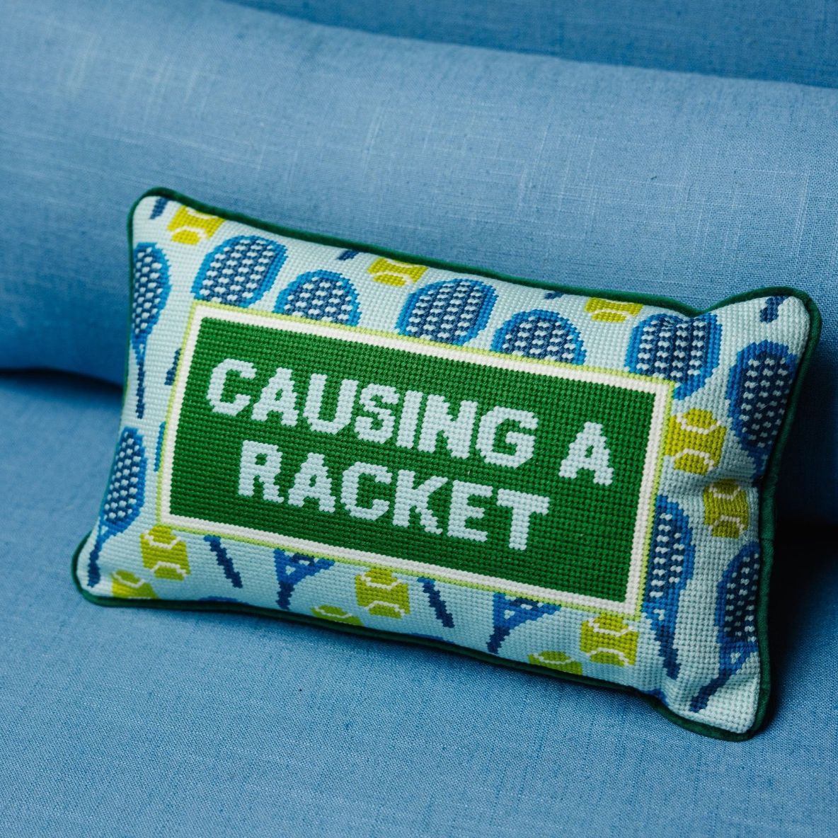 “Causing a Racket Needlepoint Pillow"